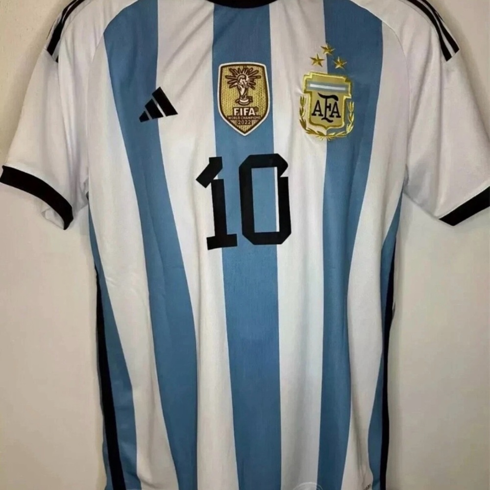 Blue and White Striped Soccer Jersey